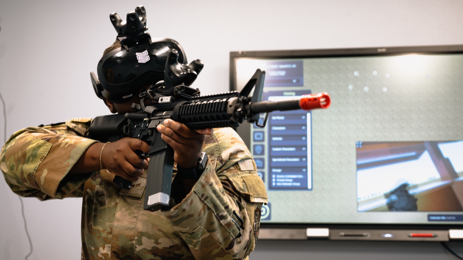 Airman 1st Class Alexandria Lavie, 87th Logistics Readiness Squadron ground transportation specialist, holds an M4 rifle during augmented reality device immersion training at Tyndall Air Force Base, Florida, Sept. 16, 2025